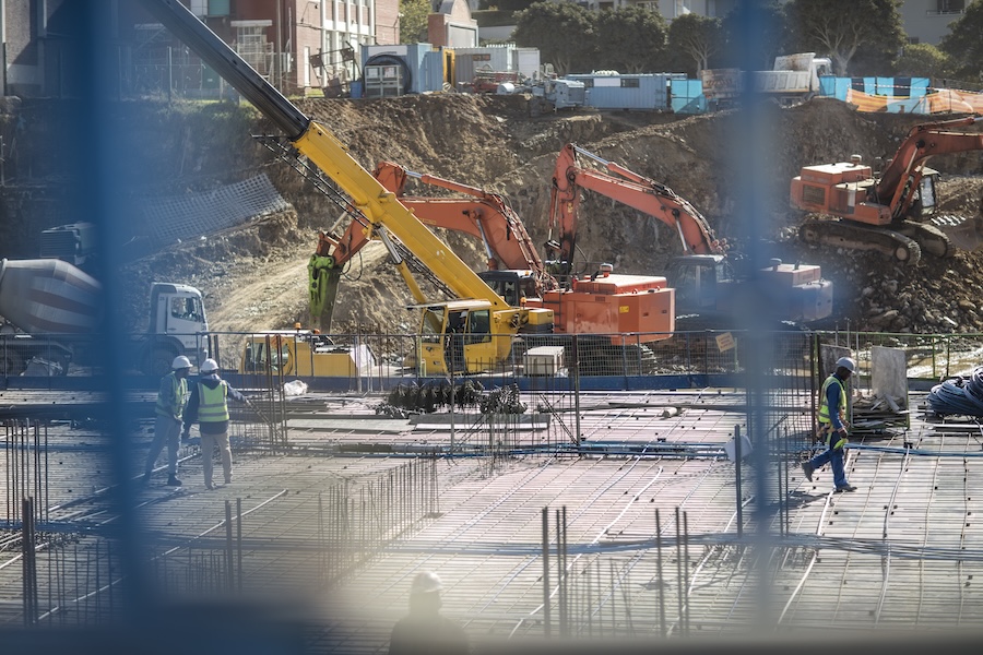 construction workers laying foundation of building 2026 01 09 09 25 23 utc
